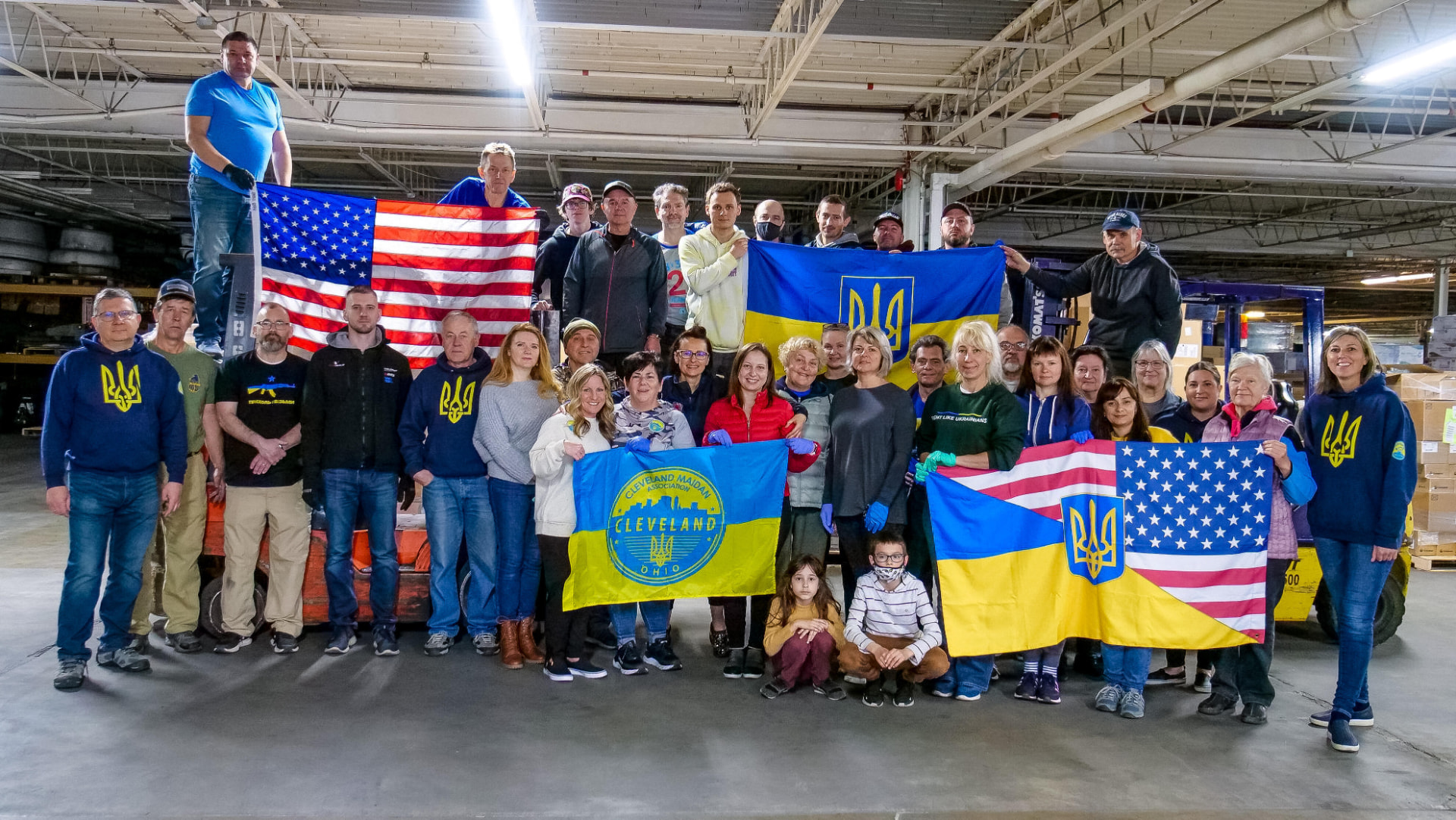 Cleveland Maidan team gathered with American and Ukrainian flags