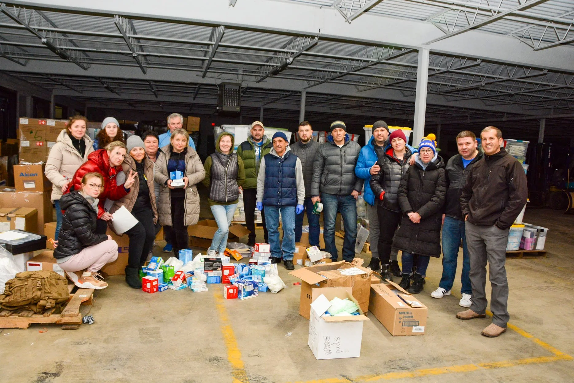 Volunteers packing aid in the Cleveland warehouse